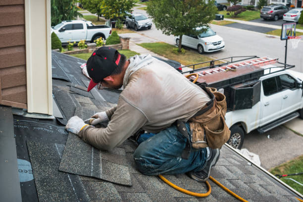 Professional Roofing technician working in West Burke, VT